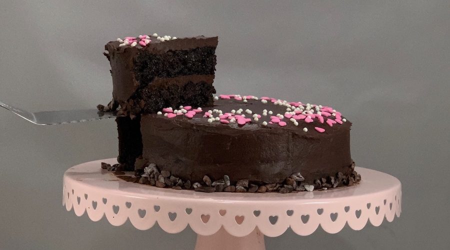 port wine cake on stand with slide lifted wide