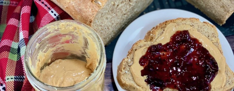 Tammy Lish Spencer, Open face peanut butter & jelly sandwich with bite and bread & jar
