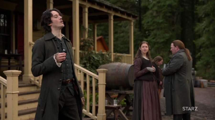 Fergus confronts the Fisher Folk couple while Lizzie looks on. 