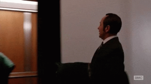 Mad men gif two men on an elevator. One asks how are you doing? The other answers, “Not great, Bob!”